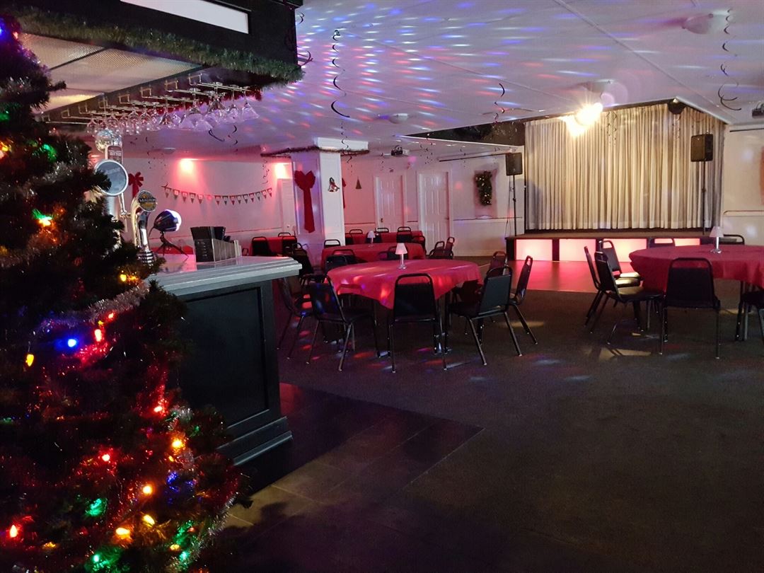 Eagles Club Christmas party venue in North Vancouver with stage and dance floor