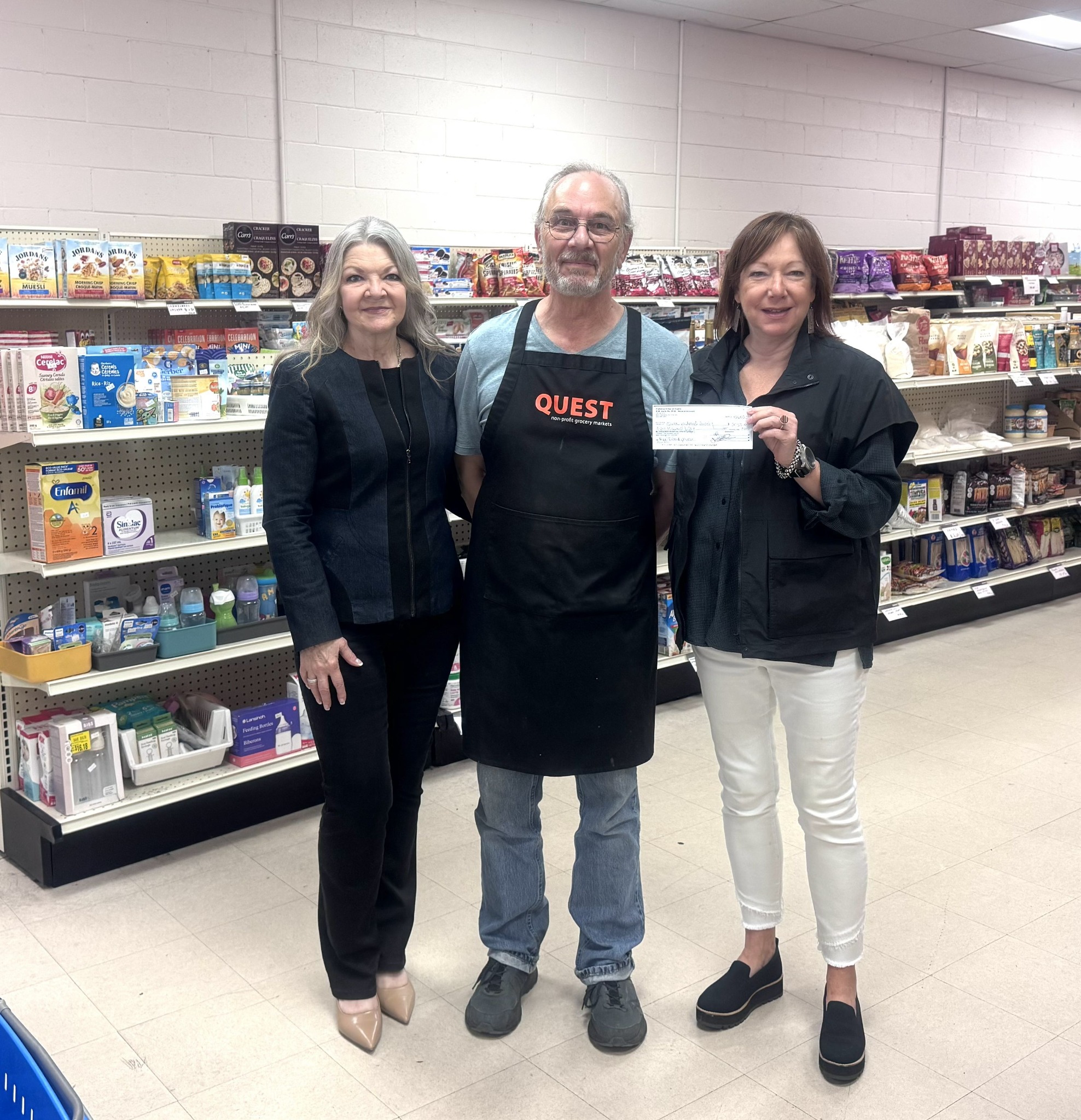 Judith with Quest manager David and Lenore from Donations
